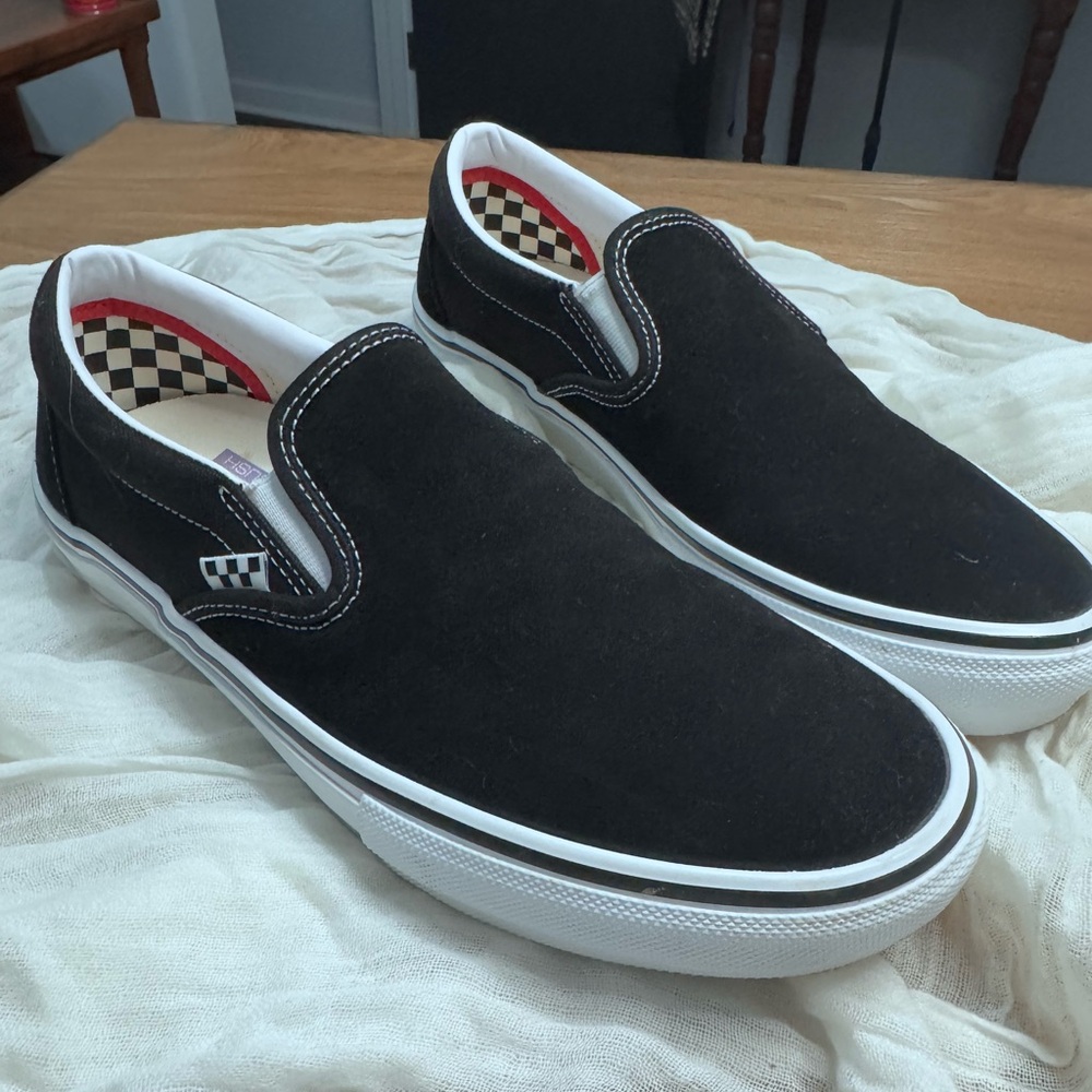 Vans Men's Black and White Slip-Ons